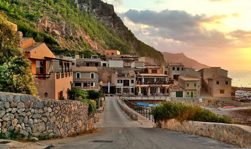 Coastal Mallorcan village reached by car hire in Mallorca