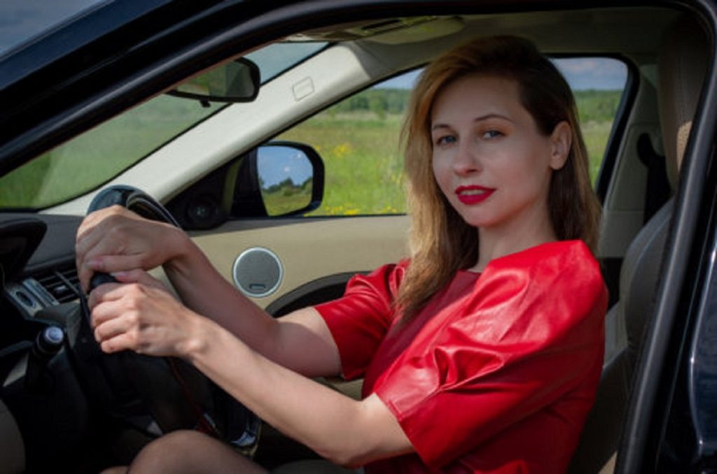 Hiring a car in Australia - woman driver ready to explore