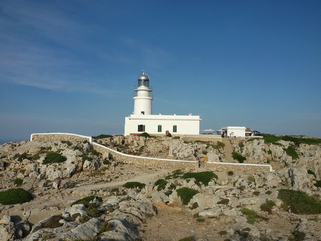 Drive 1 north coast road Menorca - Cap de Cavalleria lighthouse above the northern cliffs.