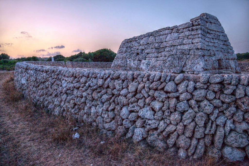 Drive 3 prehistoric trail Menorca - Naveta des Tudons burial chamber alongside the road.