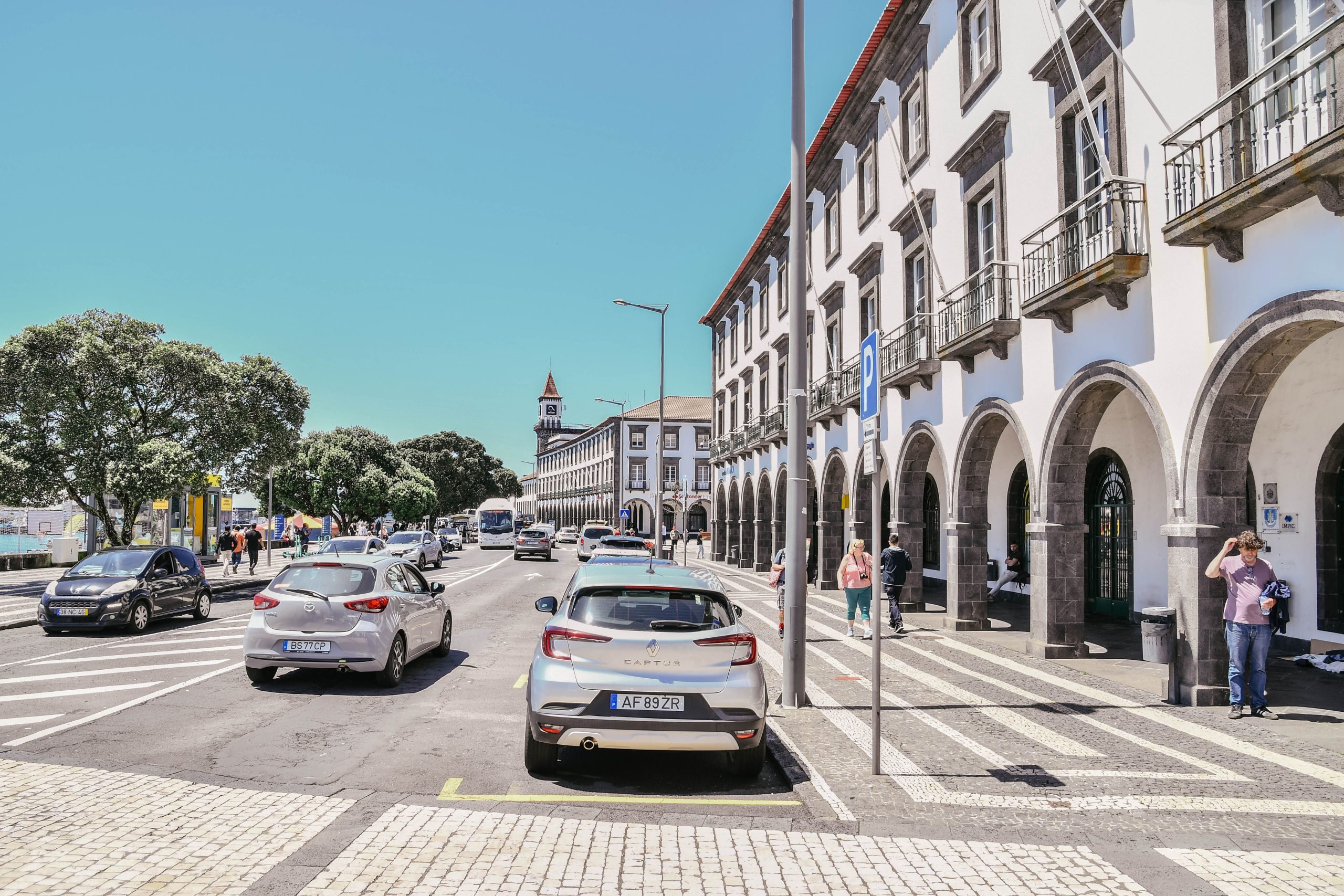 A narrow town street on Sao Miguel showing why a small hire car is easier