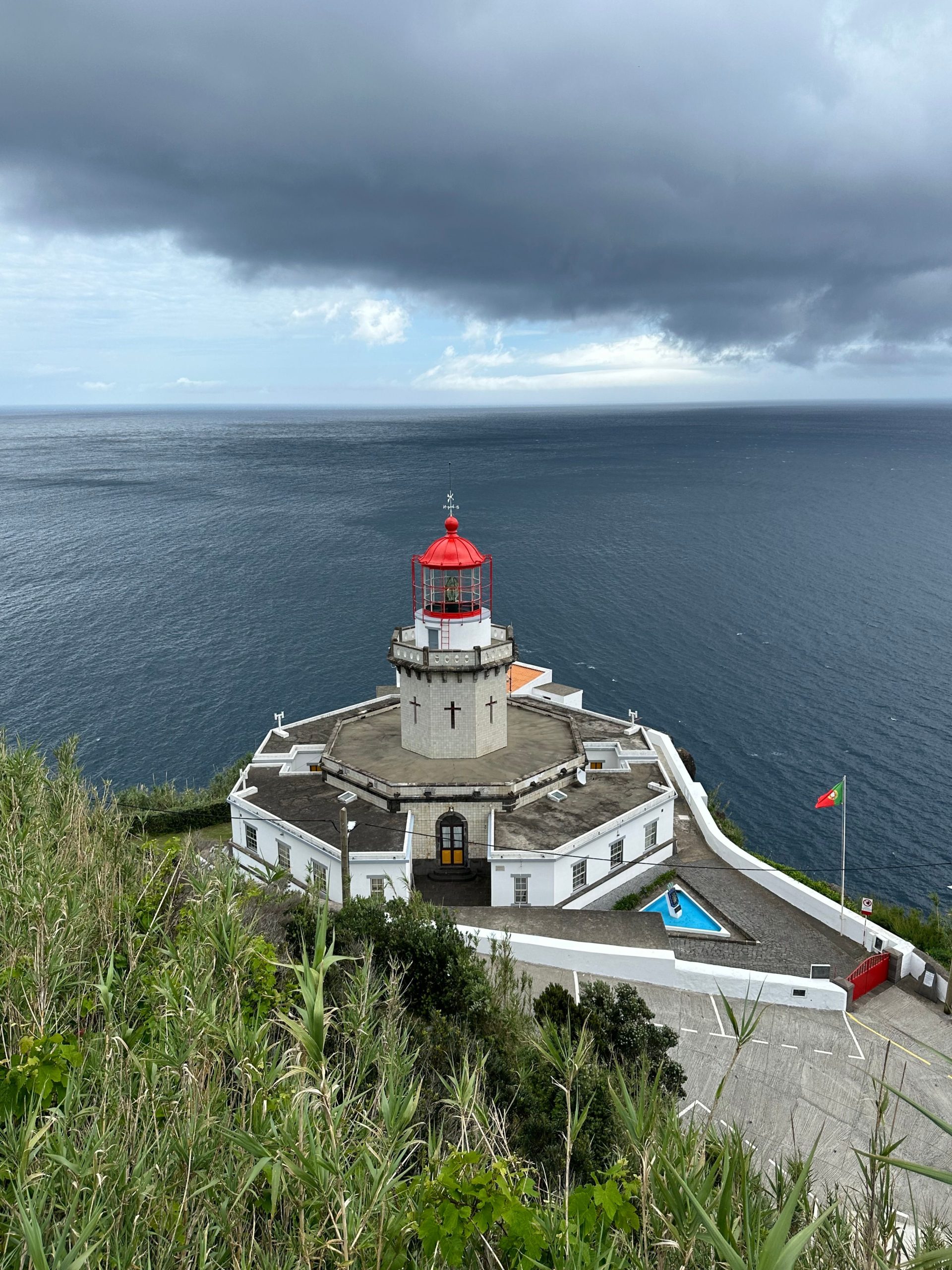 Farol do Arnel, the oldest lighthouse in the Azores, on the cliffs of east Sao Miguel