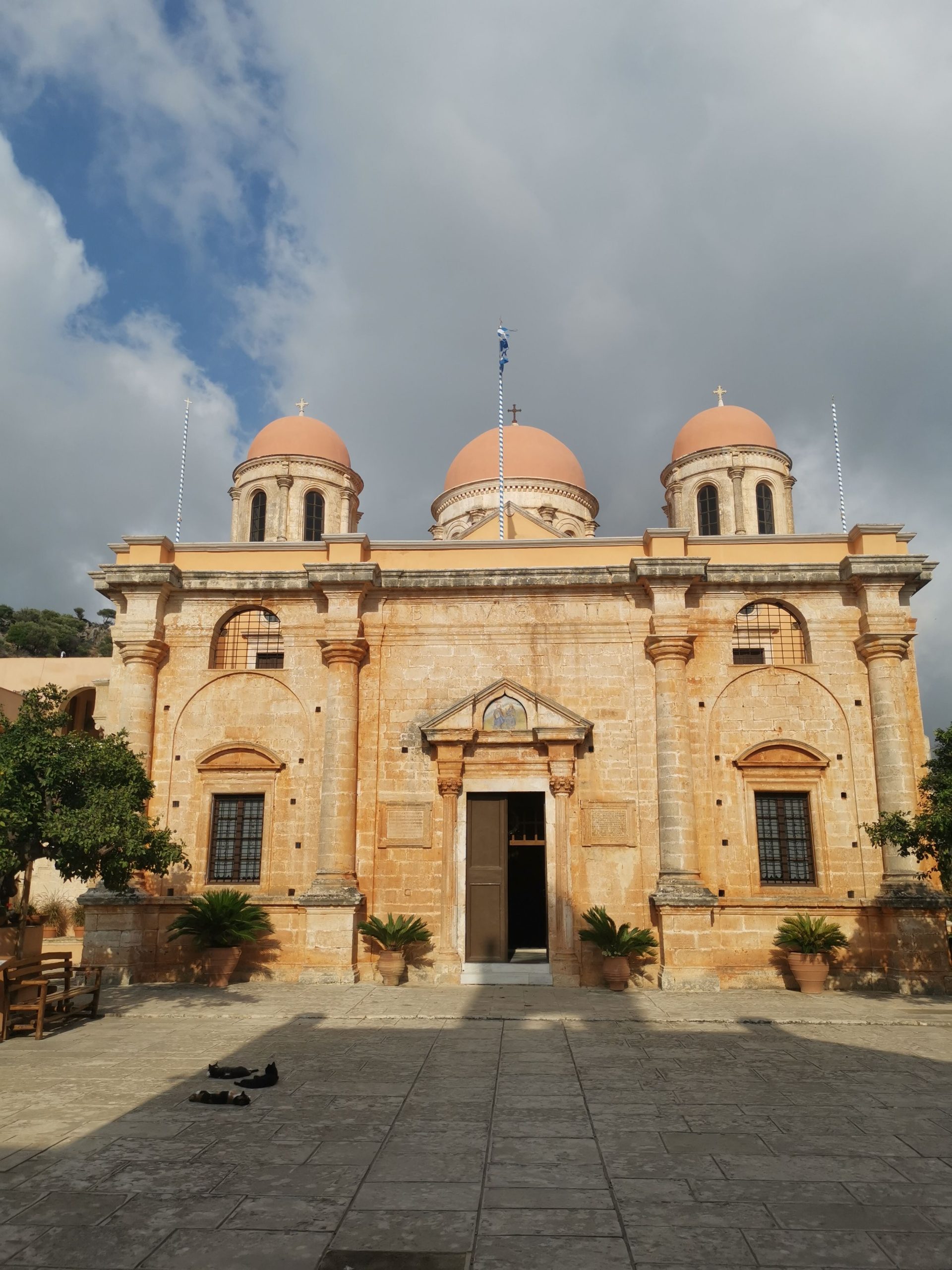 The golden stone monastery of Agia Triada on the Akrotiri scenic drive, the largest in Crete
