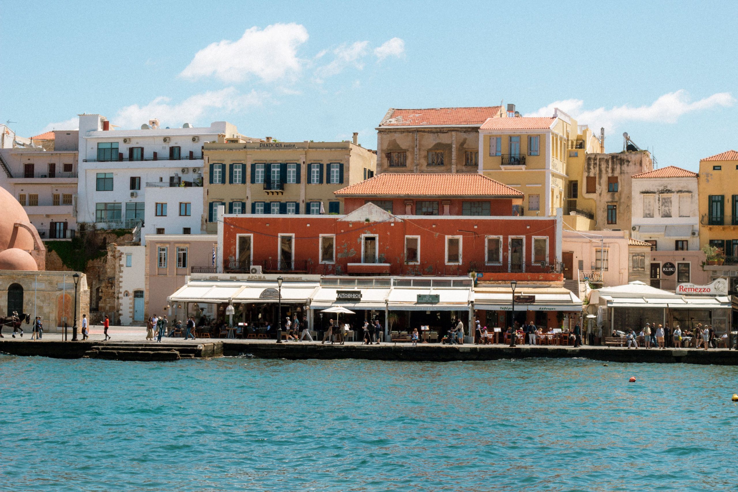 The Venetian harbour and lighthouse of Chania old town, the start of the Akrotiri scenic drive