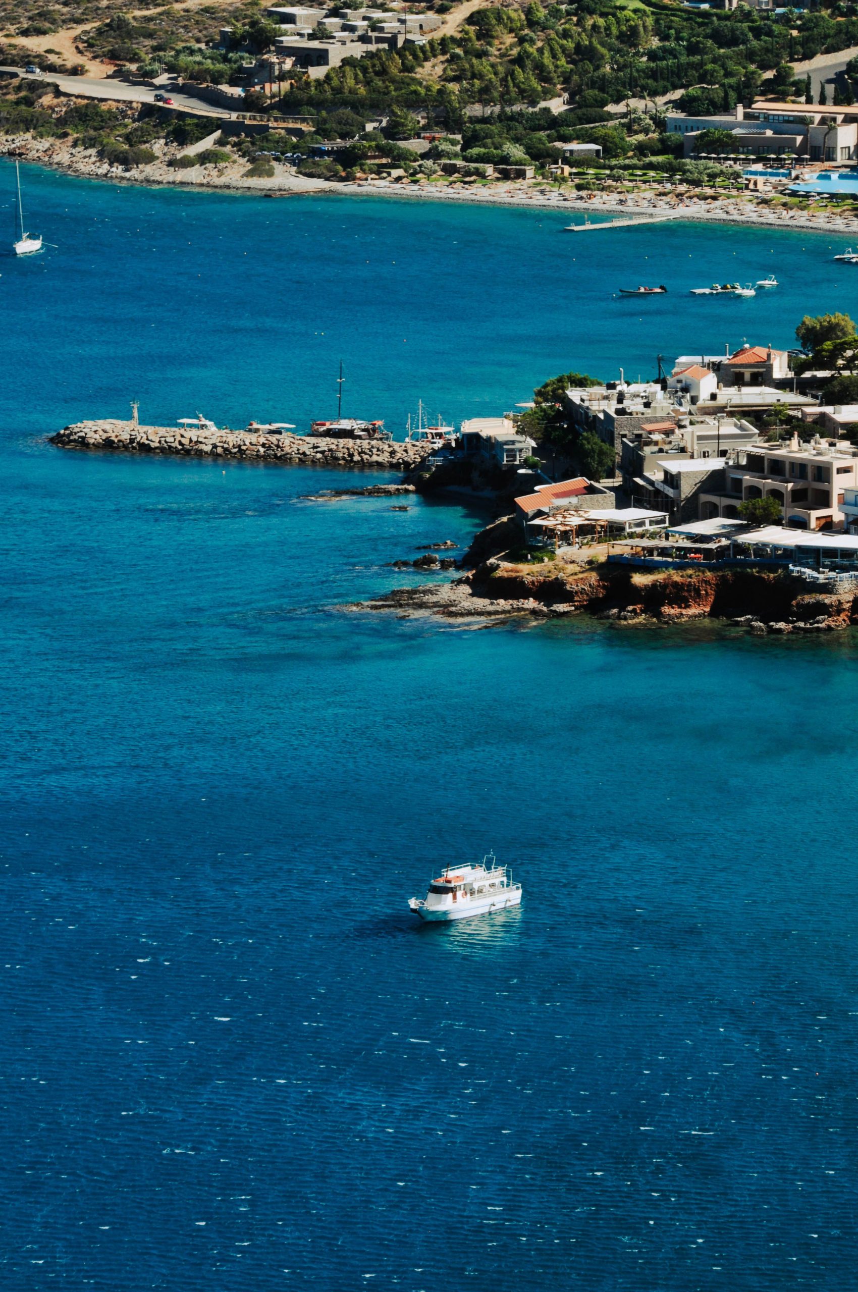 The fishing village of Plaka looking across to Spinalonga, the short boat crossing on this scenic drive