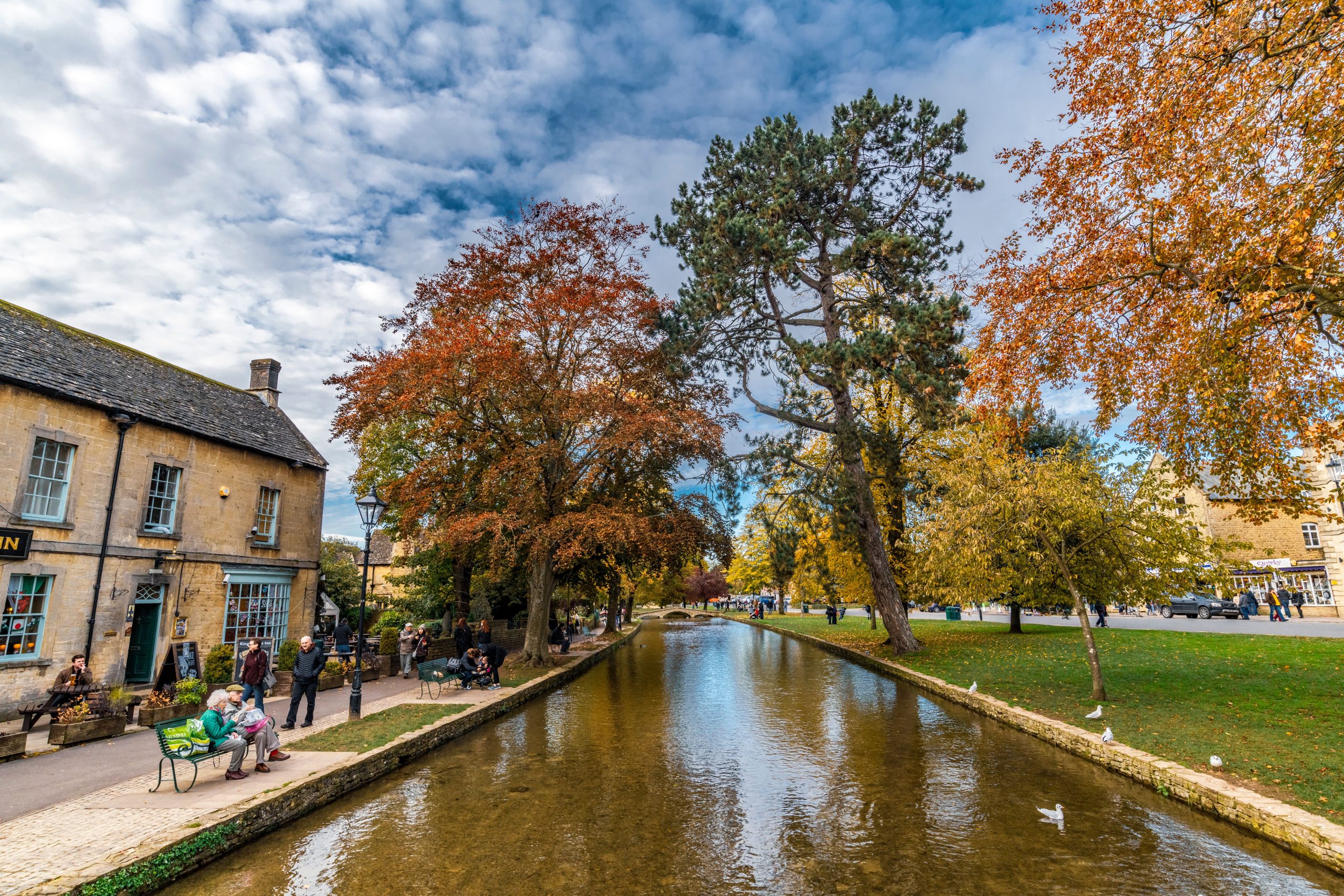 Golden autumn leaves in the Cotswolds on a family half-term road trip from London