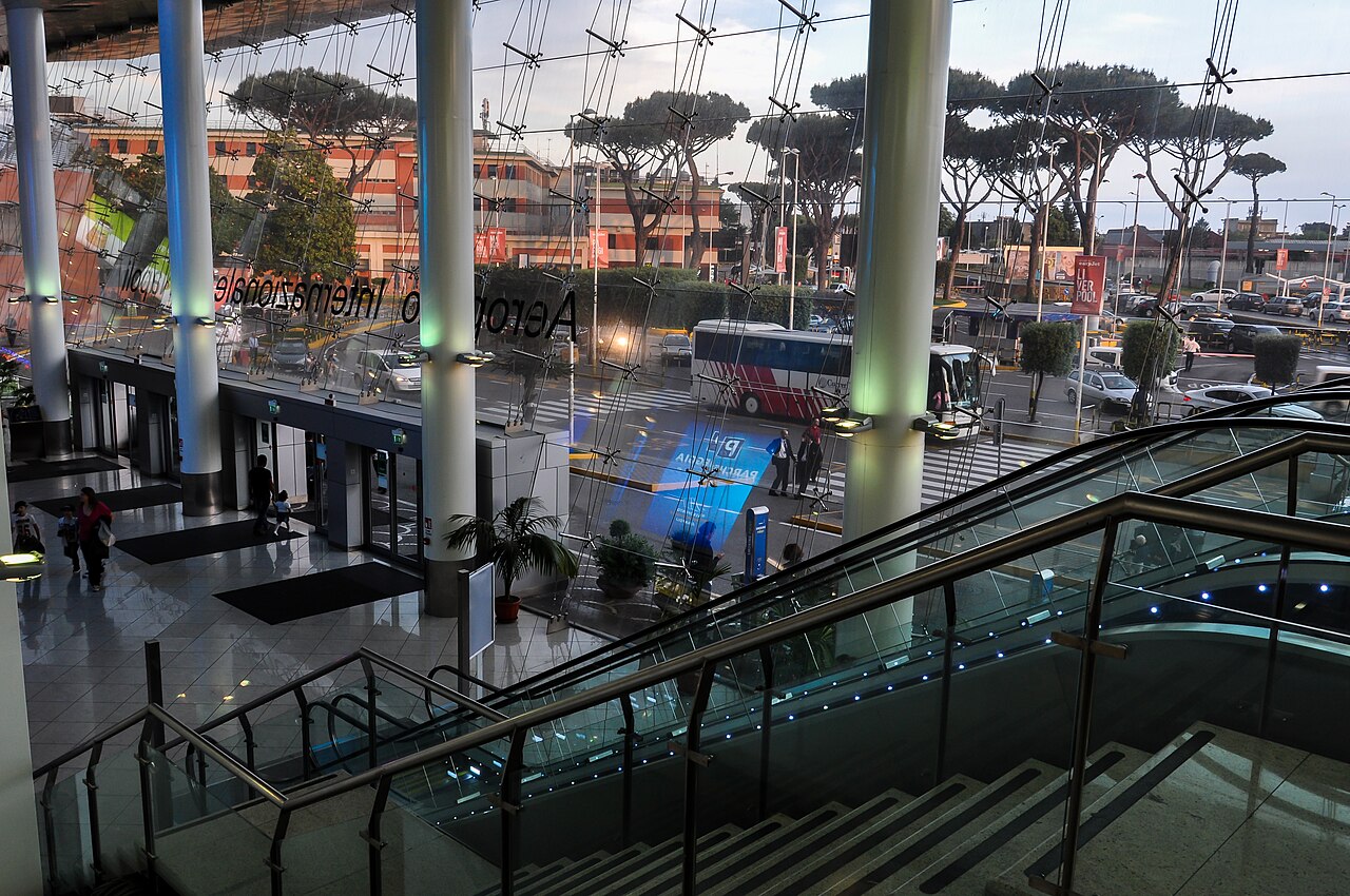 Naples Airport terminal arrivals hall where car hire at Naples Airport suppliers have their collection desks