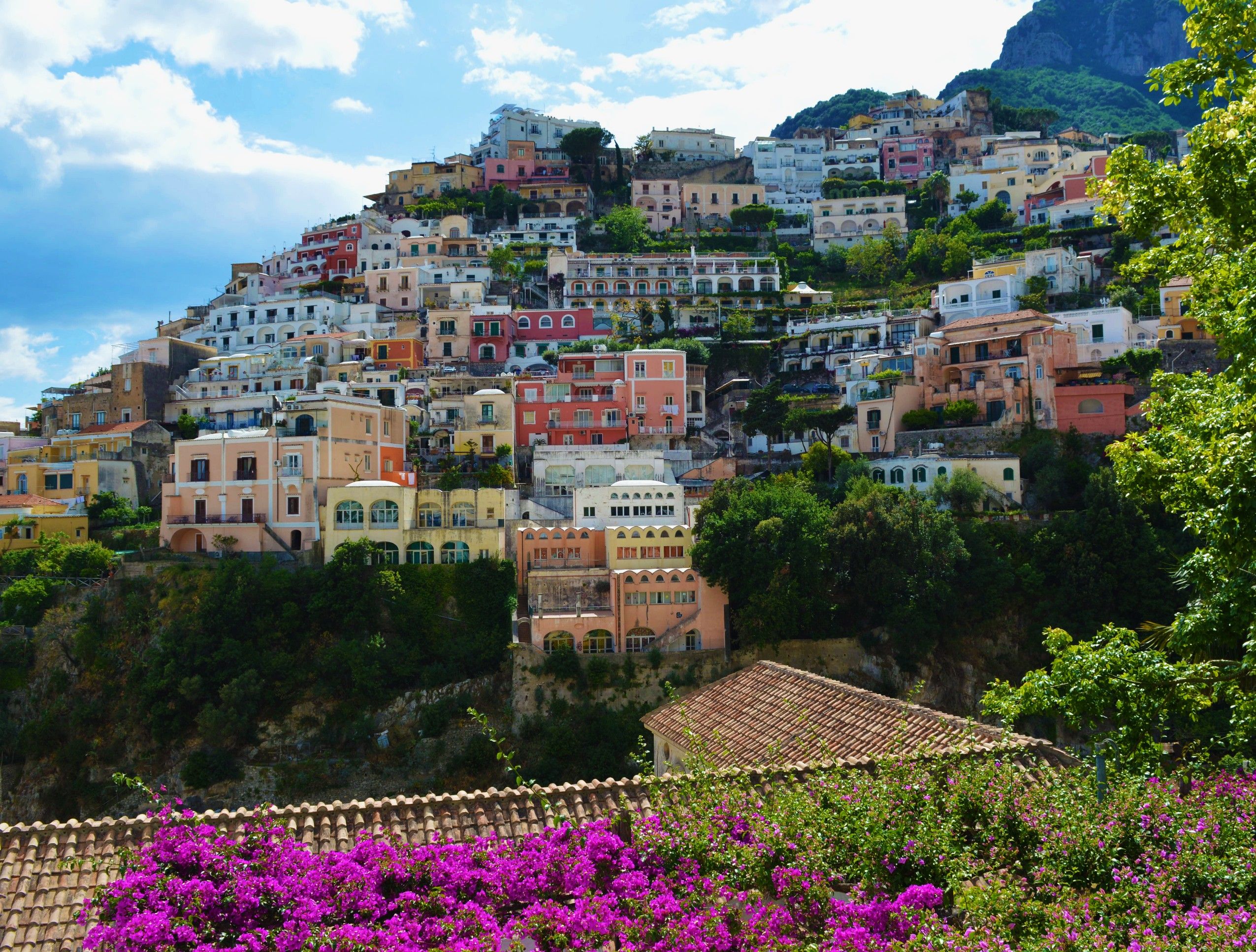 Positano's pastel houses cascading down the cliffside to the sea, reached on Day 2 of the Amalfi Coast road trip
