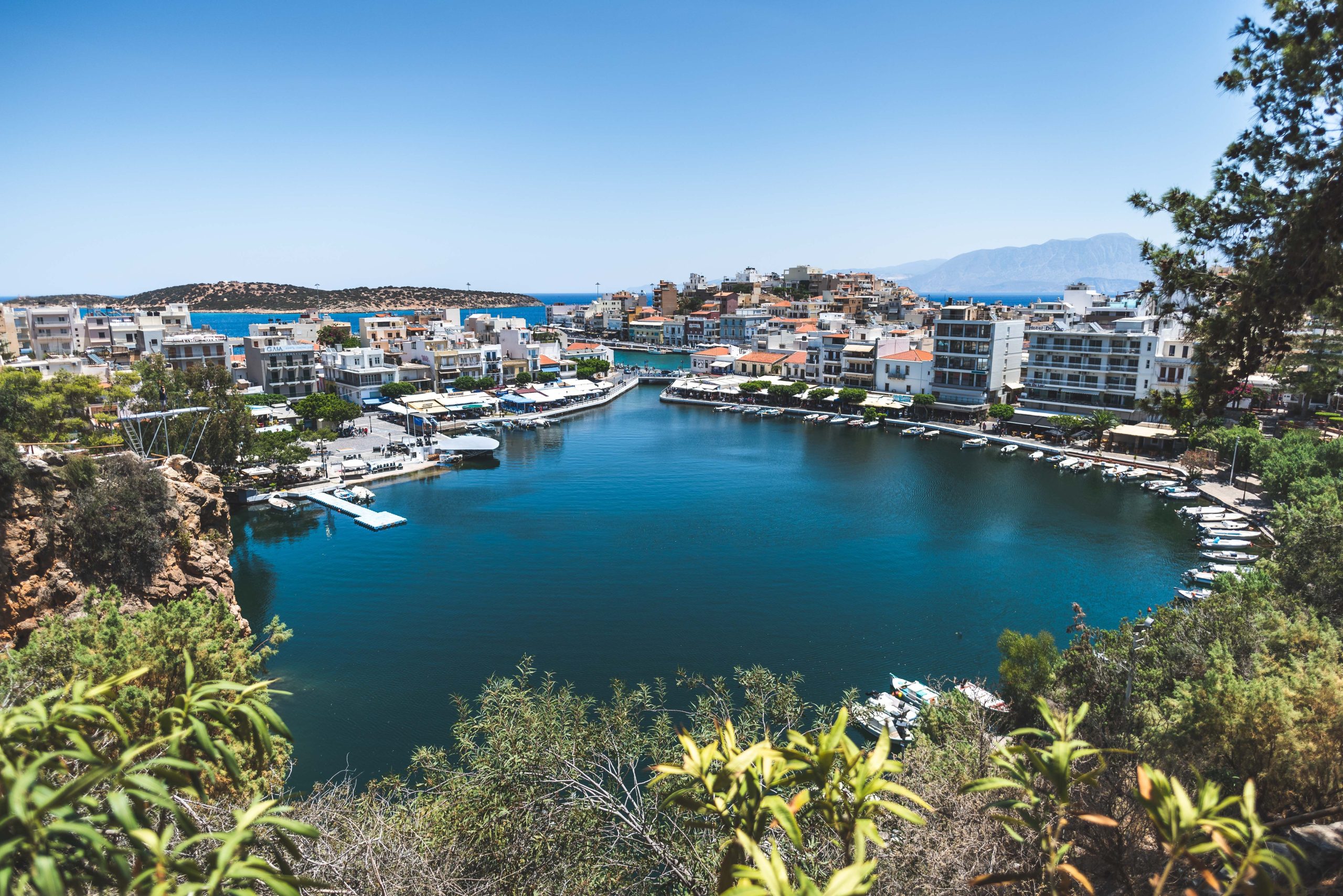 The lake and harbour of Agios Nikolaos in eastern Crete, an easy hour from Heraklion Airport by hire car